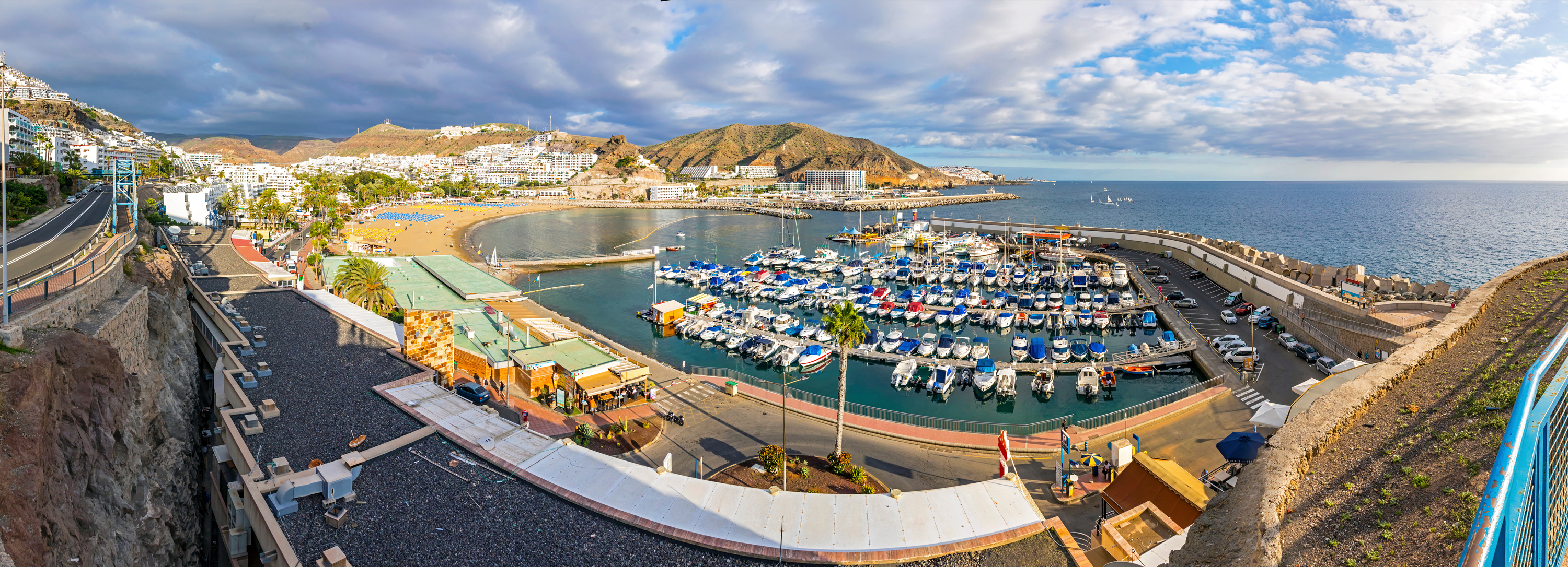 
		A marina in Puerto Rico with many boats of different sizes and colors docked.		