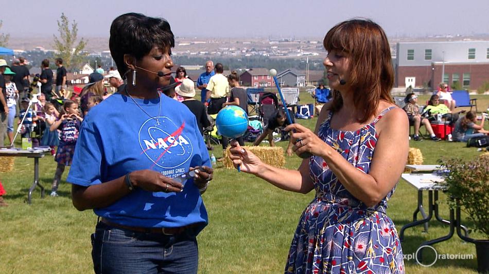 NASA interview during an eclipse event in a field